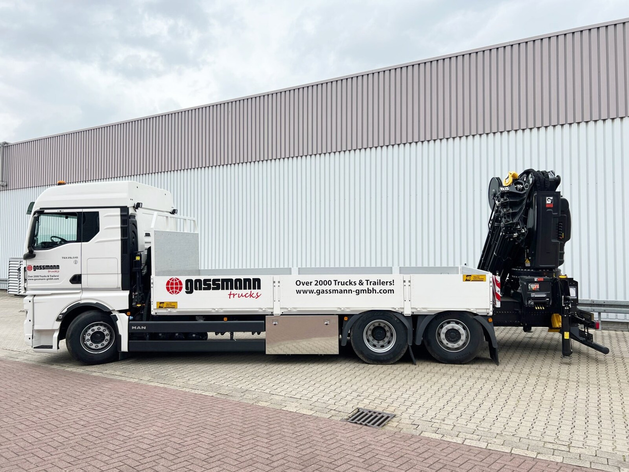 MAN TGX 26.510 6x2-4 LL CH TGX 26.510 6x2-4 LL, Kran Hiab X-HiPro 548 E-8, Lenk-/Liftachse, TwistLock 20Fuß, Funk, Retarder - Camion grue, Camion plateau: photos 2 MAN TGX 26.510 6x2-4 LL CH TGX 26.510 6x2-4 LL, Kran Hiab X-HiPro 548 E-8, Lenk-/Liftachse, TwistLock 20Fuß, Funk, Retarder - Camion grue, Camion plateau: photos 2