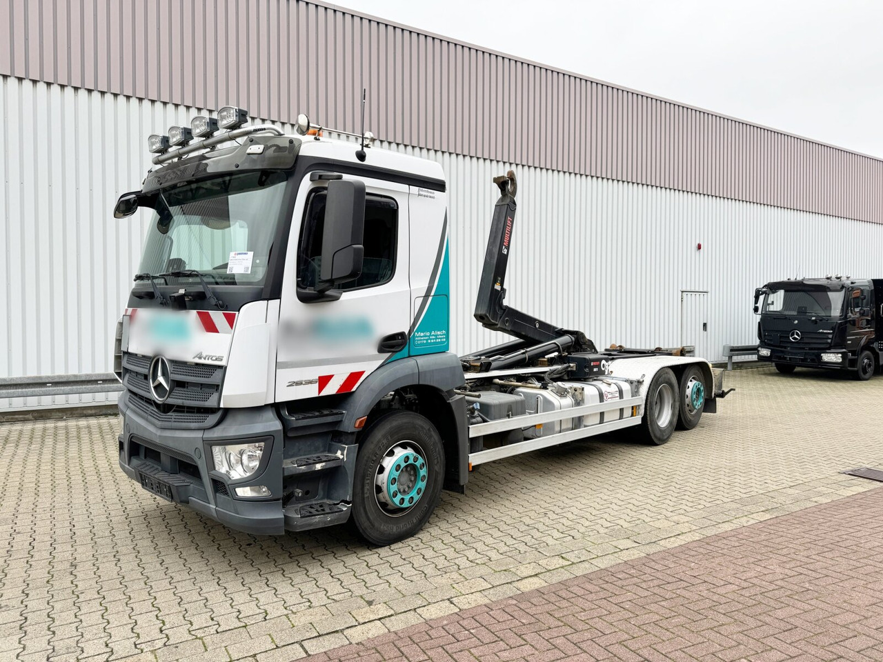 Mercedes-Benz Antos 2536 L 6x2 Antos 2536 L 6x2, Liftachse, Hiab XR 21S61 bis 7 m Container - Camion ampliroll: photos 1 Mercedes-Benz Antos 2536 L 6x2 Antos 2536 L 6x2, Liftachse, Hiab XR 21S61 bis 7 m Container - Camion ampliroll: photos 1