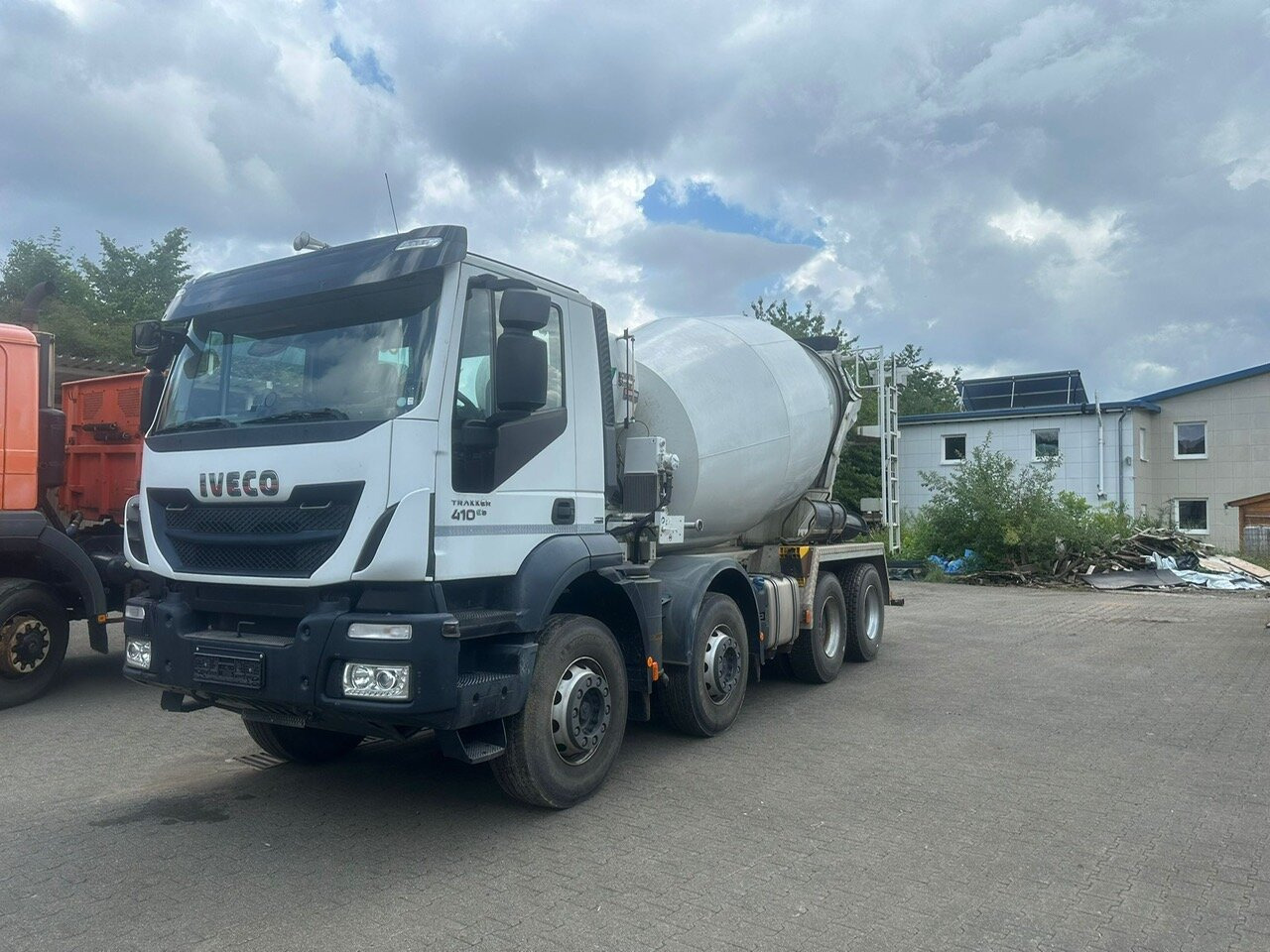 Trakker AD340T41B 8x4 Trakker AD340T41B 8x4, Betonmischer Stetter ca. 9m³ - Camion malaxeur: photos 1 Trakker AD340T41B 8x4 Trakker AD340T41B 8x4, Betonmischer Stetter ca. 9m³ - Camion malaxeur: photos 1
