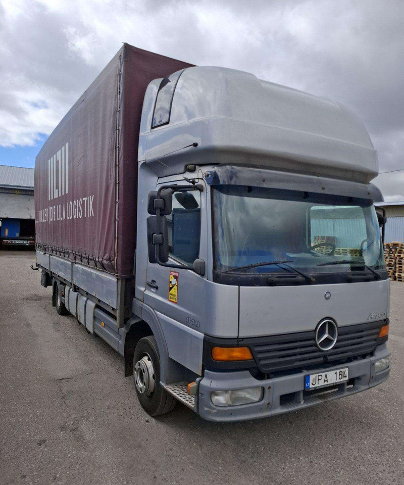 Mercedes-Benz Atego 818 - Camion à rideaux coulissants: photos 1 Mercedes-Benz Atego 818 - Camion à rideaux coulissants: photos 1