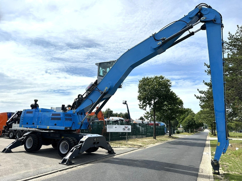 Fuchs TEREX MHL 360 OVERSLAGKRAAN / MATERIAL HANDLER / UMSCHLAGBAGGER - TOP ZUSTAND - Pelle sur pneus: photos 1 Fuchs TEREX MHL 360 OVERSLAGKRAAN / MATERIAL HANDLER / UMSCHLAGBAGGER - TOP ZUSTAND - Pelle sur pneus: photos 1