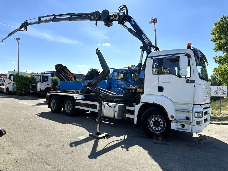 MAN TGA 26.310 6X2 HOOKLIFT + CRANE COPMA 160.4 + JIB J2 + WINCH - RADIO - LIFT + STEERING AXLE - EURO 3 - BE - Camion ampliroll, Camion grue: photos 1 MAN TGA 26.310 6X2 HOOKLIFT + CRANE COPMA 160.4 + JIB J2 + WINCH - RADIO - LIFT + STEERING AXLE - EURO 3 - BE - Camion ampliroll, Camion grue: photos 1