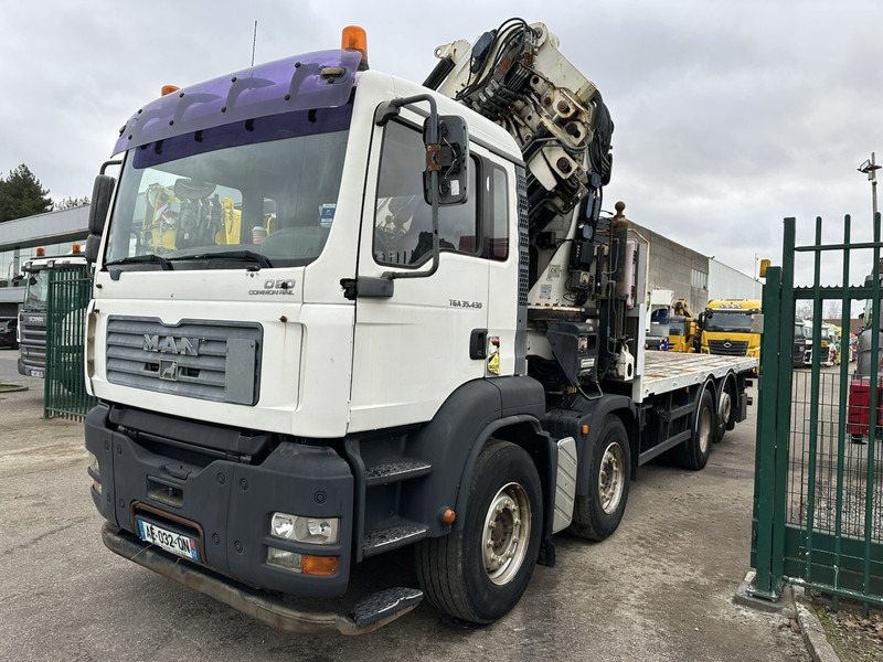 MAN TGA 35.430 8x2 + KRAN HIAB 700 E-6 + JIB 165X-3 - RETARDER - PRITSCHE 6m70~8m50 EXTENDABLE - MANUAL GEARBOX ZF - LIFT + STEERING AXLE - Camion plateau, Camion grue: photos 2 MAN TGA 35.430 8x2 + KRAN HIAB 700 E-6 + JIB 165X-3 - RETARDER - PRITSCHE 6m70~8m50 EXTENDABLE - MANUAL GEARBOX ZF - LIFT + STEERING AXLE - Camion plateau, Camion grue: photos 2