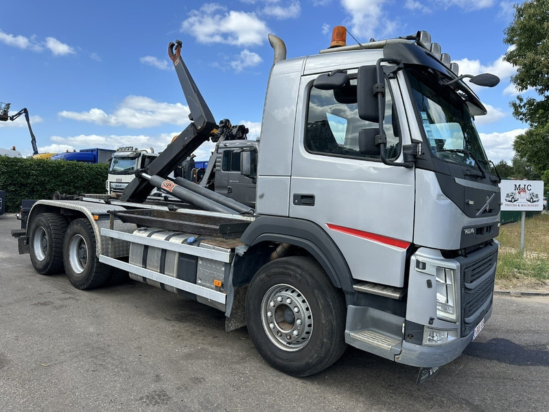 Volvo FM 420 6x4 AJK HOOKLIFT / HAAK 20T - 5760mm - WB 3m90 - HUB REDUCTION / STEEL SUSPENSION - EURO 6 - BE TRUCK - Camion ampliroll: photos 1 Volvo FM 420 6x4 AJK HOOKLIFT / HAAK 20T - 5760mm - WB 3m90 - HUB REDUCTION / STEEL SUSPENSION - EURO 6 - BE TRUCK - Camion ampliroll: photos 1