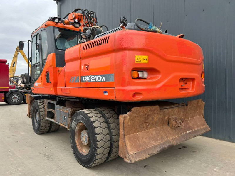 Doosan DX210W - Pelle sur pneus: photos 2 Doosan DX210W - Pelle sur pneus: photos 2