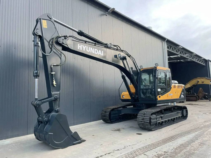 Hyundai R215L - Pelle sur chenille: photos 1 Hyundai R215L - Pelle sur chenille: photos 1