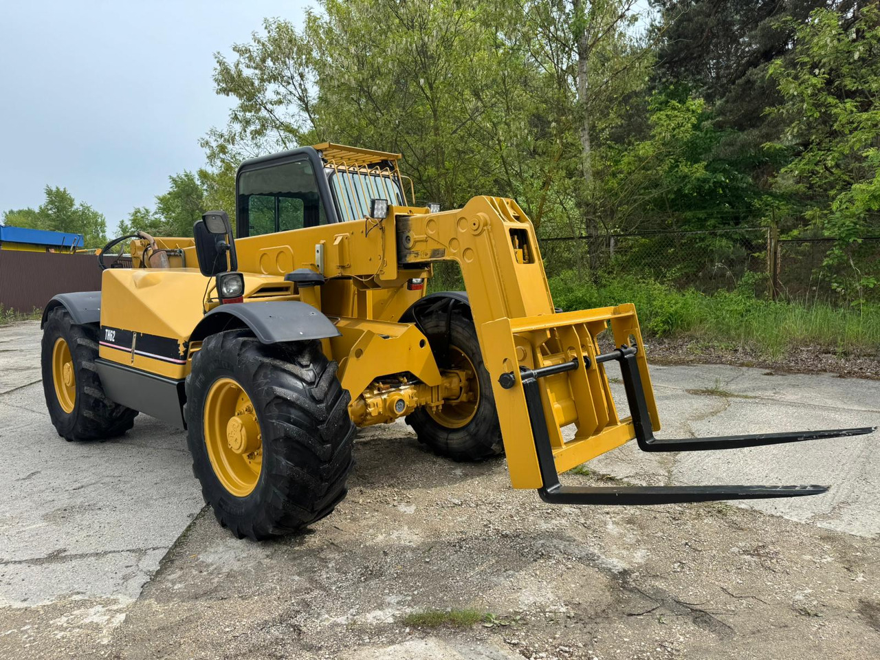 CATERPILLAR CAT TH 62 - Chargeuse sur pneus: photos 1 CATERPILLAR CAT TH 62 - Chargeuse sur pneus: photos 1