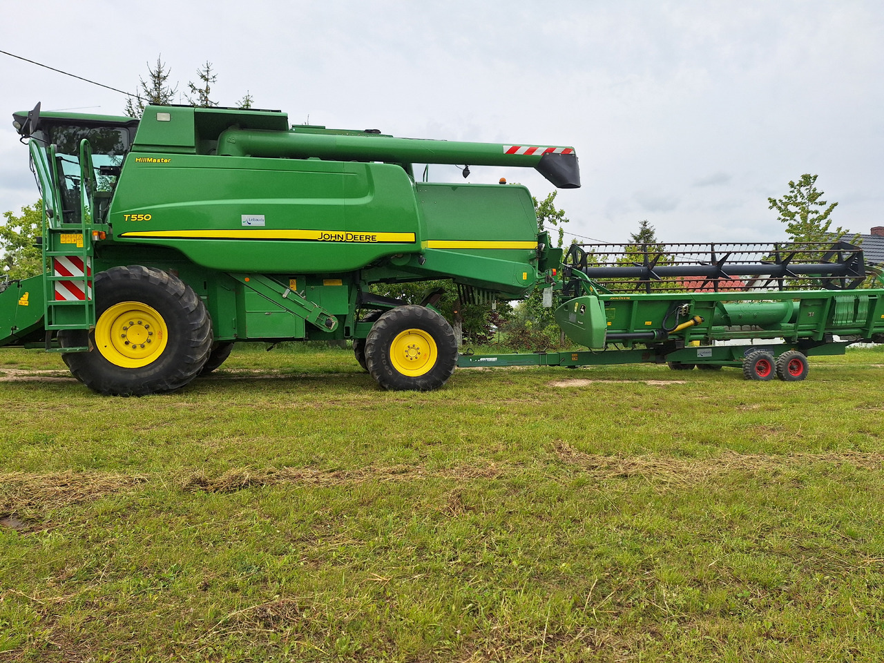 John Deere T550 - Moissonneuse-batteuse: photos 1 John Deere T550 - Moissonneuse-batteuse: photos 1