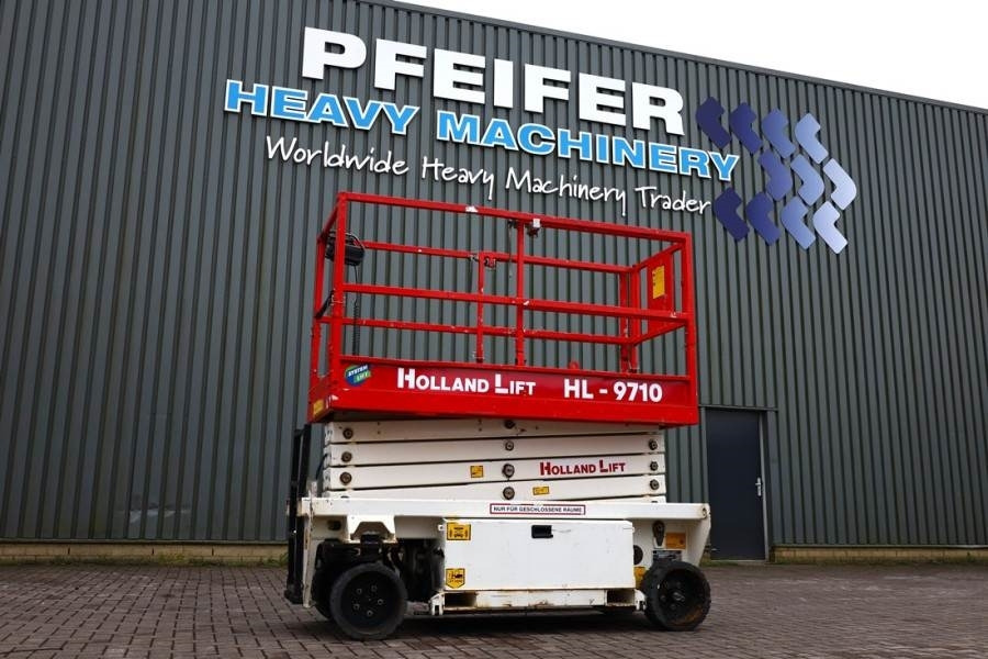 Holland Lift Ecostar HL-9710 Electric, 12m Working Height, 325k - Nacelle ciseaux: photos 1 Holland Lift Ecostar HL-9710 Electric, 12m Working Height, 325k - Nacelle ciseaux: photos 1