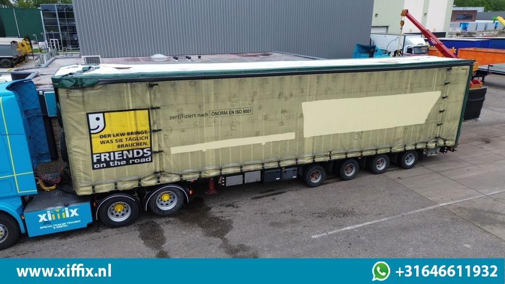 Meusburger 4-ass. Vlakke Mega oplegger met elektrische huifopbouw / 2x naloop ge - Semi-remorque plateau: photos 1 Meusburger 4-ass. Vlakke Mega oplegger met elektrische huifopbouw / 2x naloop ge - Semi-remorque plateau: photos 1