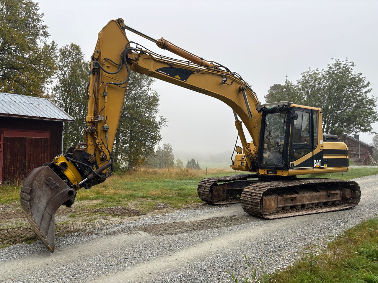 CAT 318BL - Pelle: photos 1 CAT 318BL - Pelle: photos 1