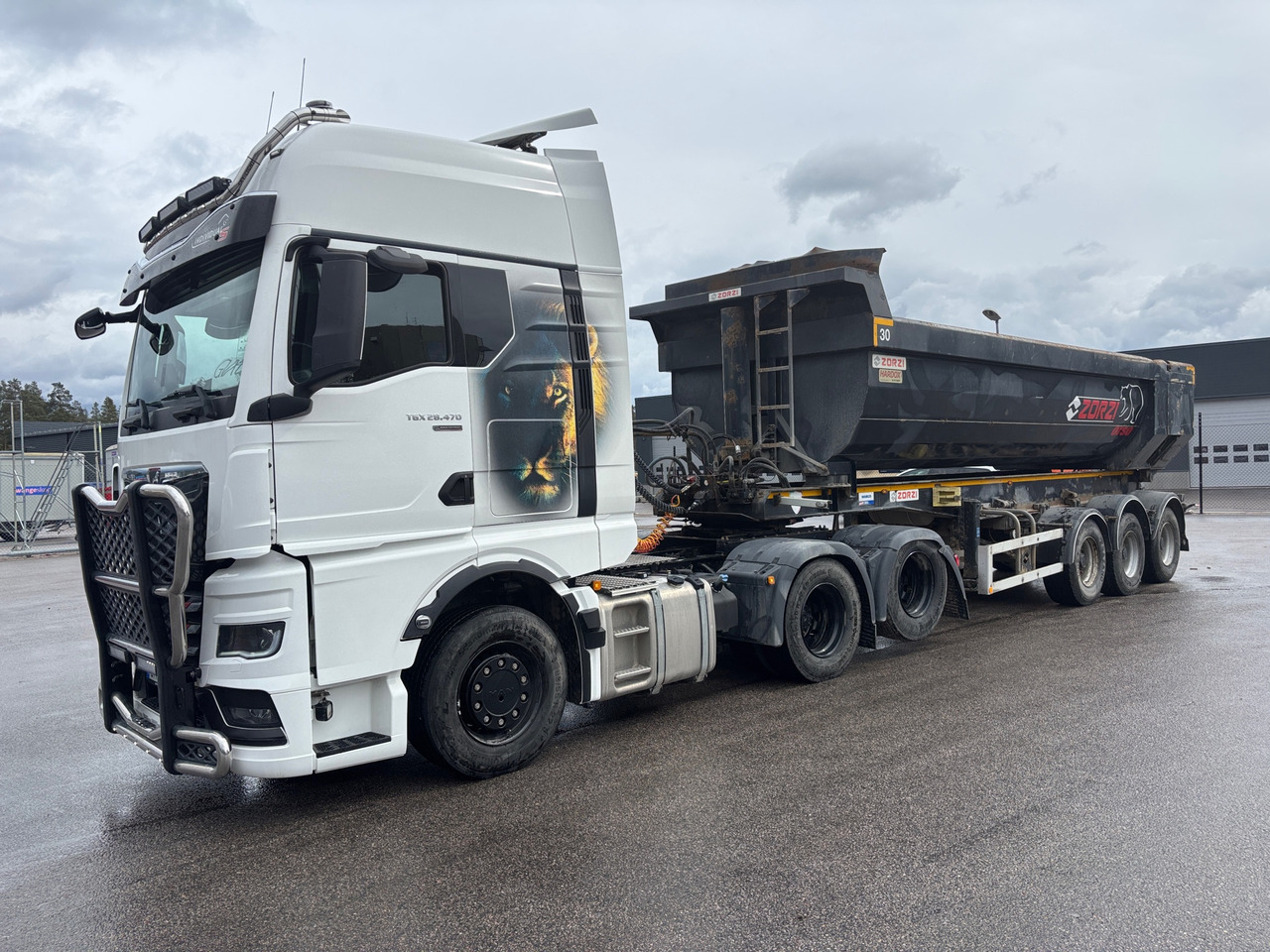 MAN TGX 28.4706X2 Individual - Camion ampliroll: photos 1 MAN TGX 28.4706X2 Individual - Camion ampliroll: photos 1