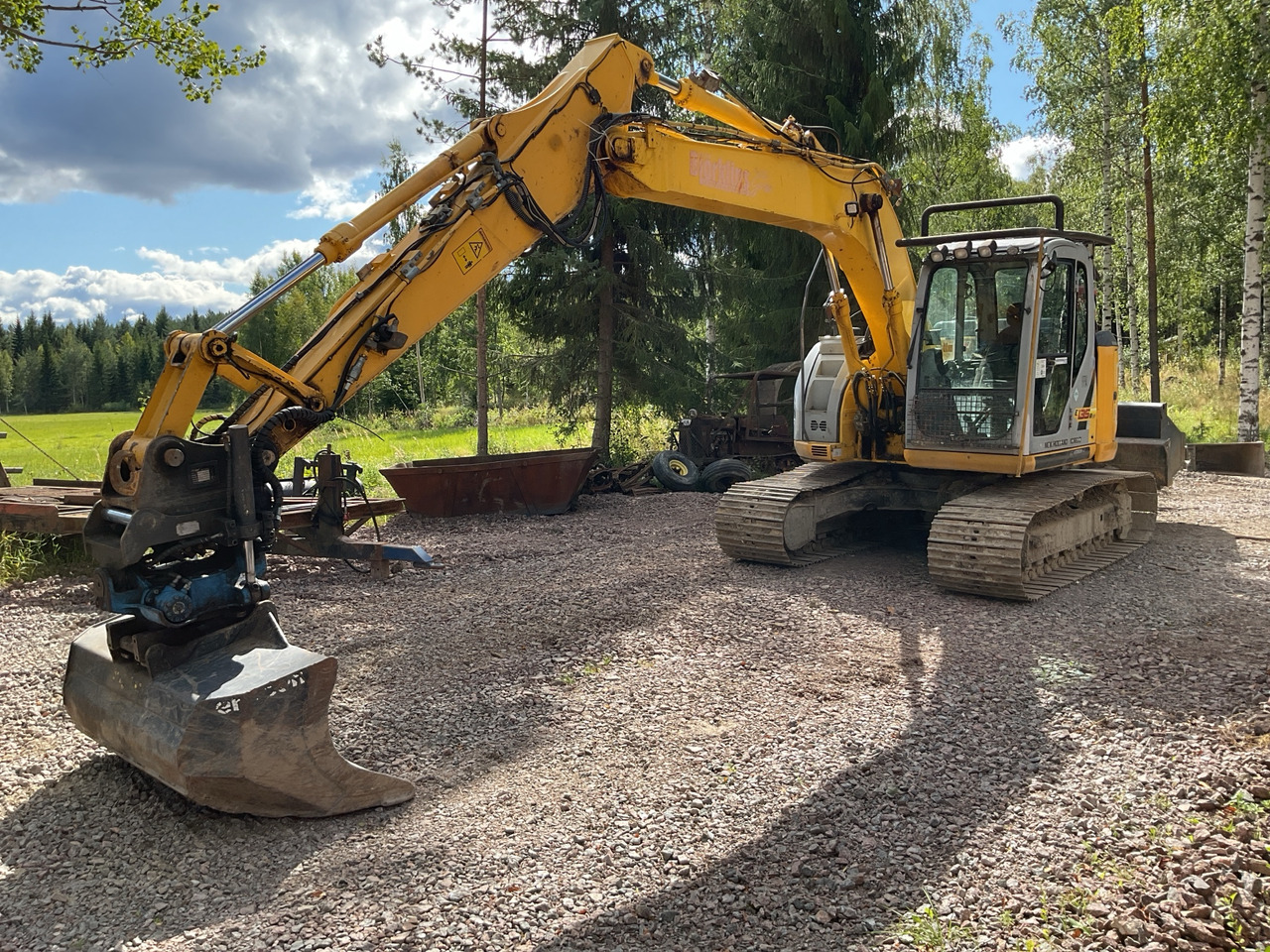 New Holland Kobelco E 135 BSR-2 - Pelle: photos 1 New Holland Kobelco E 135 BSR-2 - Pelle: photos 1