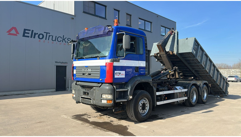 MAN TGA 26.460 (WITH CONTAINER / BELGIAN TRUCK / PERFECT / 6X4 / MANUAL GEARBOX / BOITE MANUELLE) - Camion ampliroll: photos 1 MAN TGA 26.460 (WITH CONTAINER / BELGIAN TRUCK / PERFECT / 6X4 / MANUAL GEARBOX / BOITE MANUELLE) - Camion ampliroll: photos 1