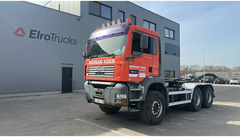 MAN TGA 33.360 (MANUAL GEARBOX / BELGIAN TRUCK / 6X4 / BIG AXLE / SEMI MANUAL PUMP) - Camion ampliroll: photos 1 MAN TGA 33.360 (MANUAL GEARBOX / BELGIAN TRUCK / 6X4 / BIG AXLE / SEMI MANUAL PUMP) - Camion ampliroll: photos 1