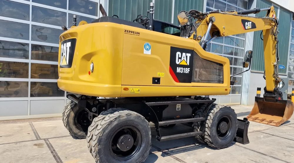 Caterpillar M318F, 2019 ROK, IMPORT NIEMCY - Pelle sur pneus: photos 1 Caterpillar M318F, 2019 ROK, IMPORT NIEMCY - Pelle sur pneus: photos 1