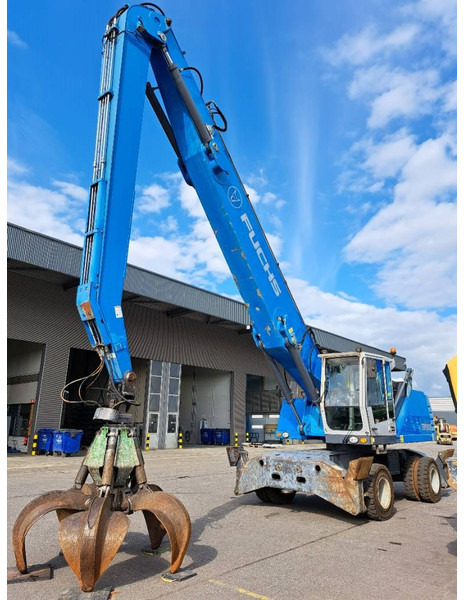 Fuchs MHL 350 E - Pelle de manutention: photos 1 Fuchs MHL 350 E - Pelle de manutention: photos 1