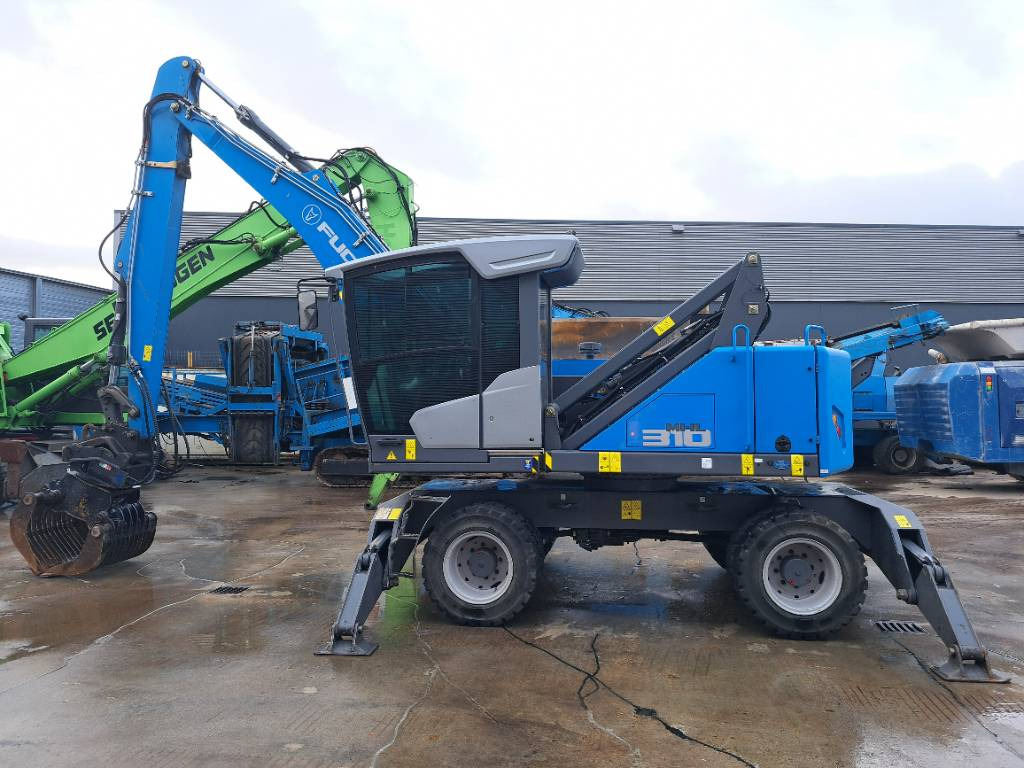 Fuchs MHL310F + Grapple - Pelle de manutention: photos 4 Fuchs MHL310F + Grapple - Pelle de manutention: photos 4