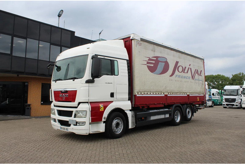 MAN TGX 26.440 * EURO5 * 6X2 * LIFT AXLE * - Camion à rideaux coulissants: photos 1 MAN TGX 26.440 * EURO5 * 6X2 * LIFT AXLE * - Camion à rideaux coulissants: photos 1