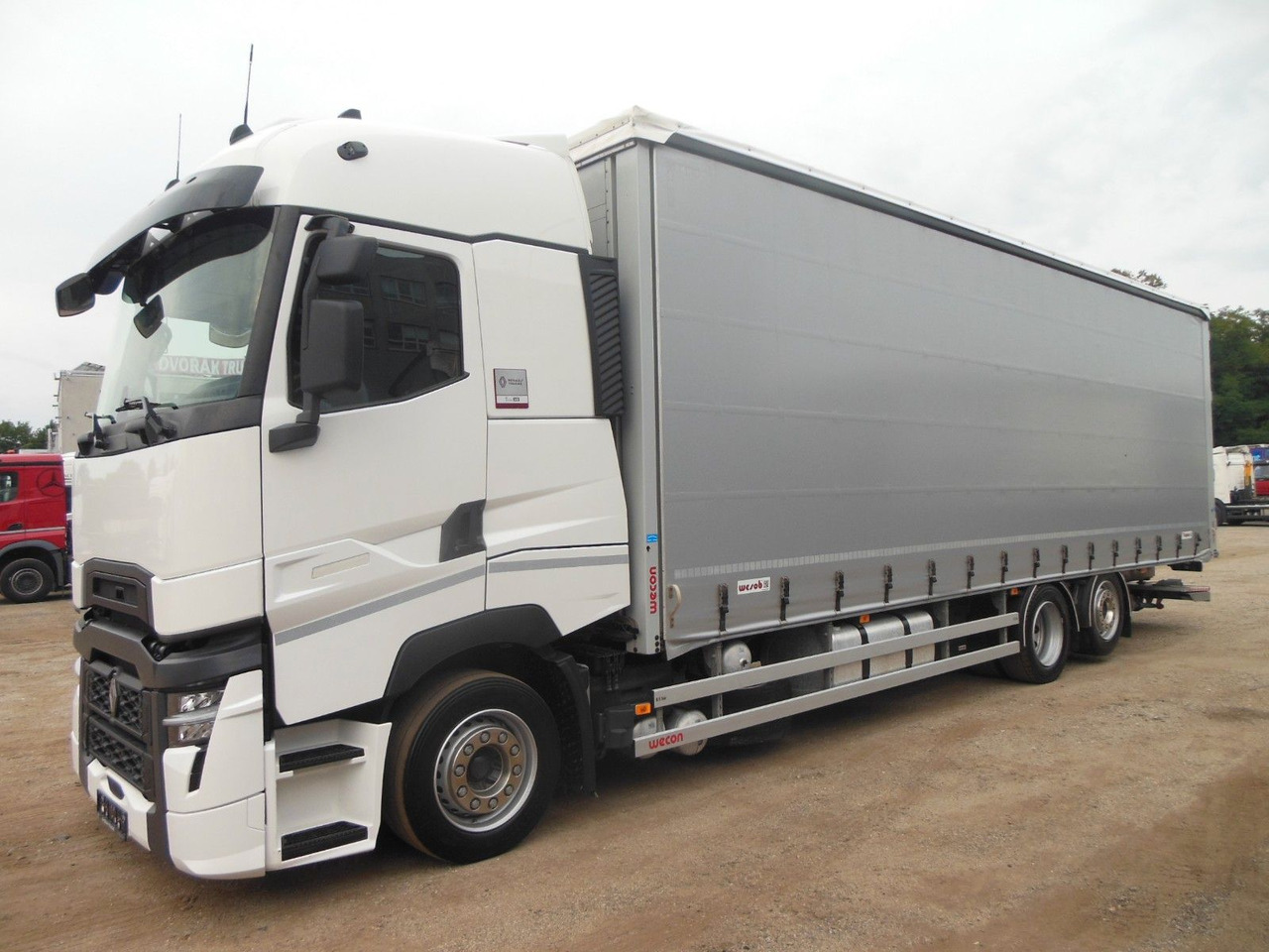 Renault T 440, 6X2, D-HOLLANDIA, 23 PALETTEN, WIE NEUE! - Camion à rideaux coulissants: photos 1 Renault T 440, 6X2, D-HOLLANDIA, 23 PALETTEN, WIE NEUE! - Camion à rideaux coulissants: photos 1
