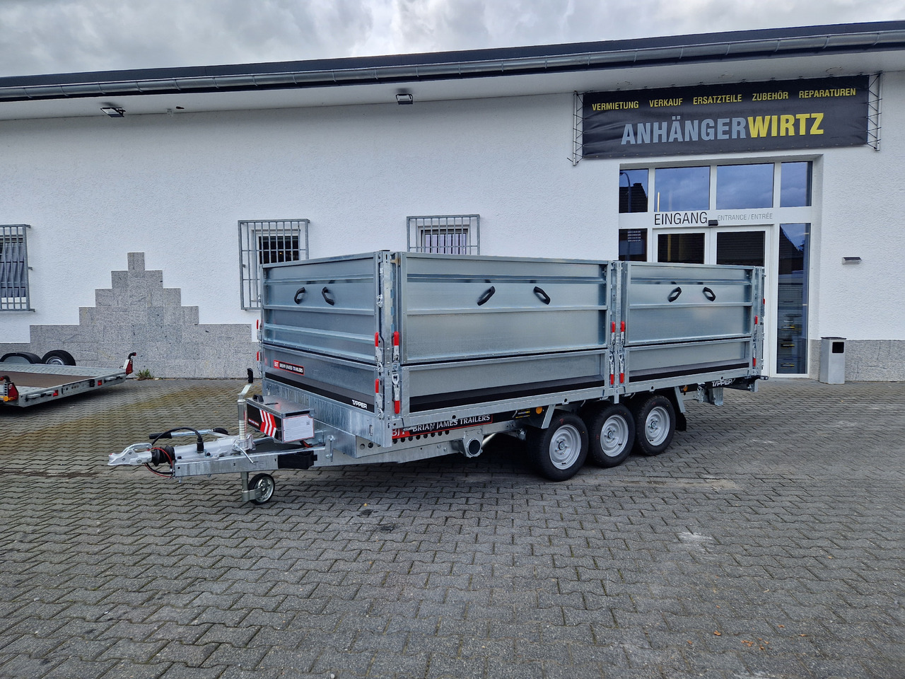 Brian James Trailer Tipper 400x200x100cm Aufsatz elektro blackline LED Tridem 3500kg Modell 24 - Remorque benne: photos 1 Brian James Trailer Tipper 400x200x100cm Aufsatz elektro blackline LED Tridem 3500kg Modell 24 - Remorque benne: photos 1