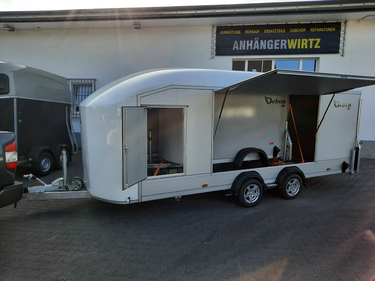 Cargo Roadster 2000 550x220x204cm Poly white Car Edition 3500kg Pullman Vollausstattung - Remorque pour moto: photos 1 Cargo Roadster 2000 550x220x204cm Poly white Car Edition 3500kg Pullman Vollausstattung - Remorque pour moto: photos 1