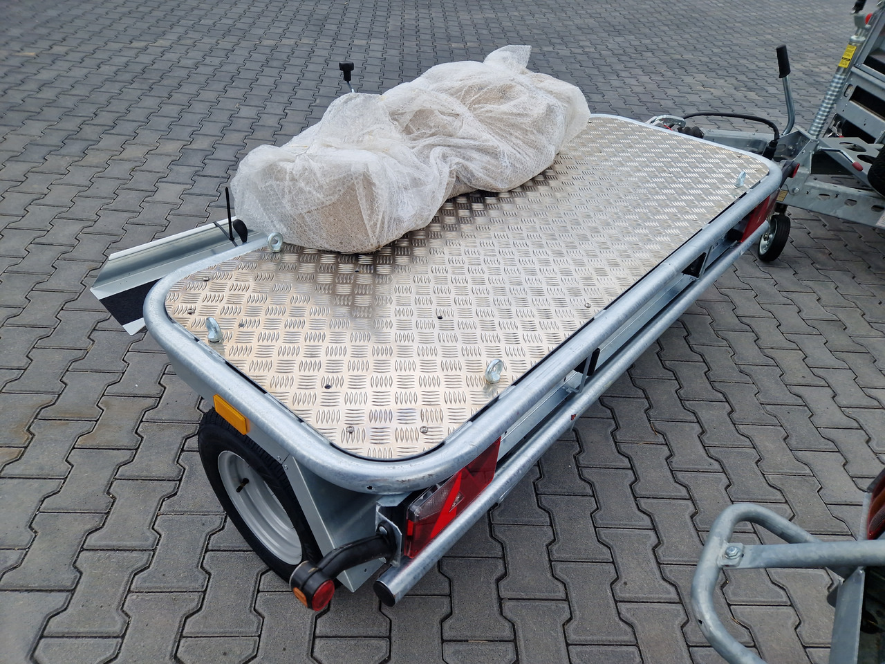 Motorradanhänger Roadster Motocamp 1 quer 200x80cm 750kg 100km/H - Remorque pour moto: photos 3 Motorradanhänger Roadster Motocamp 1 quer 200x80cm 750kg 100km/H - Remorque pour moto: photos 3