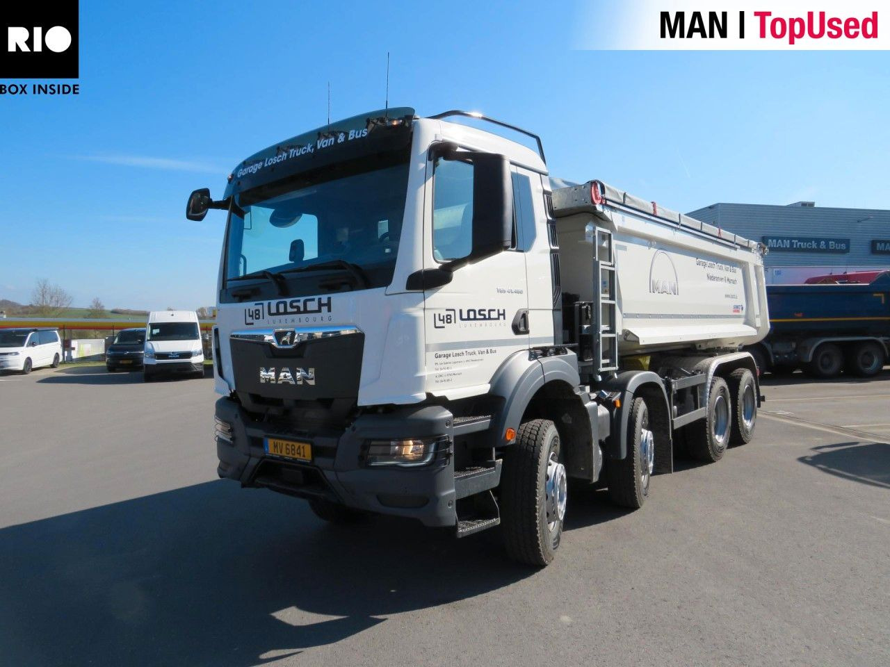 MAN TGS 41.480 8x4 BB CH Schmitz Muldenkipper - Camion multibenne: photos 1 MAN TGS 41.480 8x4 BB CH Schmitz Muldenkipper - Camion multibenne: photos 1