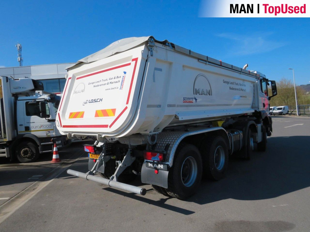 MAN TGS 41.480 8x4 BB CH Schmitz Muldenkipper - Camion multibenne: photos 5 MAN TGS 41.480 8x4 BB CH Schmitz Muldenkipper - Camion multibenne: photos 5