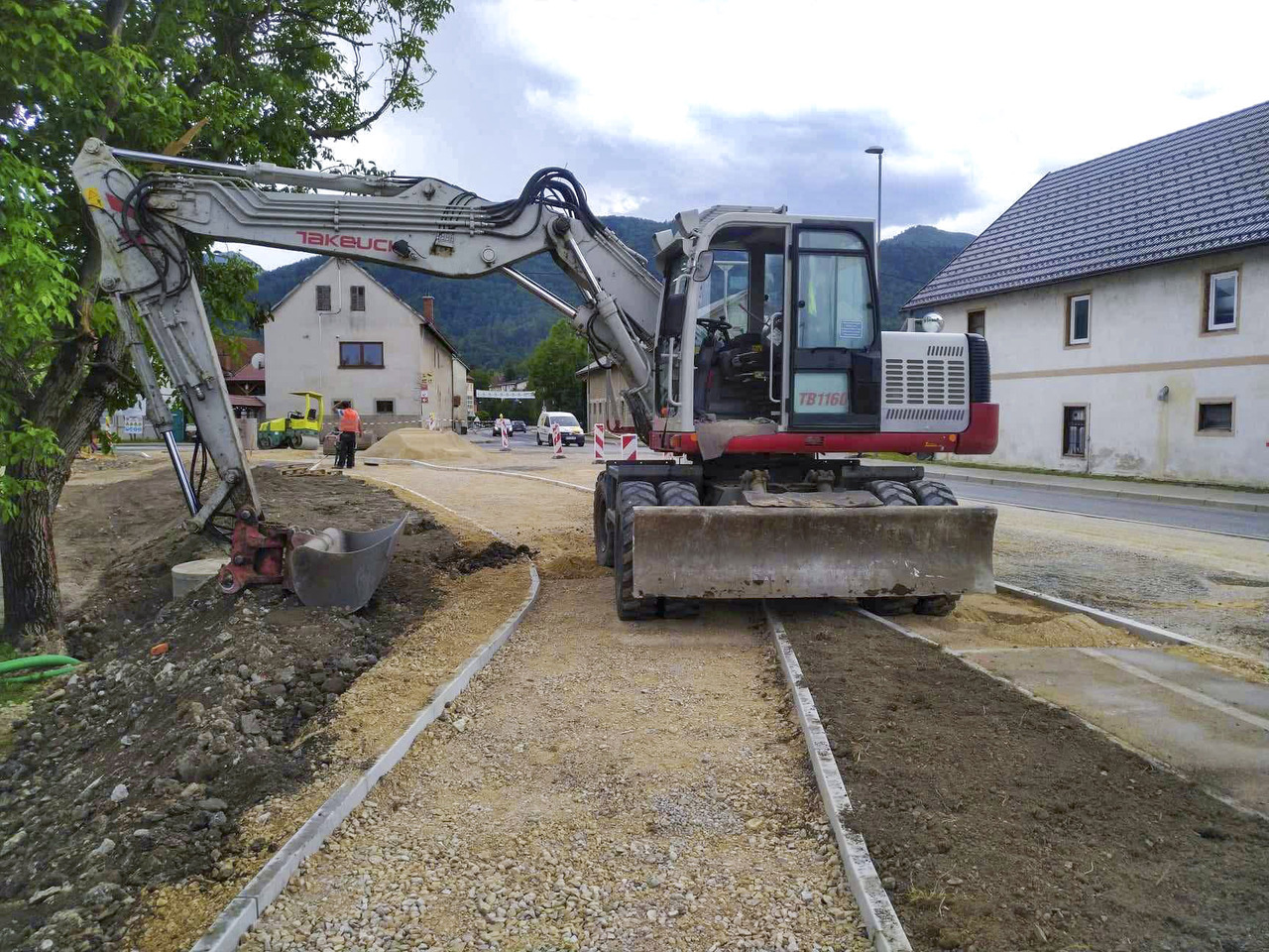 Takeuchi TB1160W - Pelle sur pneus: photos 1 Takeuchi TB1160W - Pelle sur pneus: photos 1