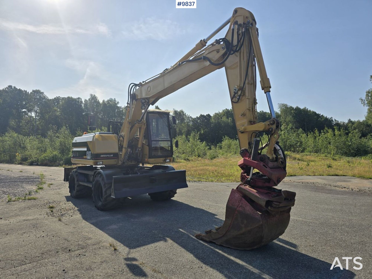 Wheel Excavator CAT M315 (See Video) - Pelle sur pneus: photos 5 Wheel Excavator CAT M315 (See Video) - Pelle sur pneus: photos 5