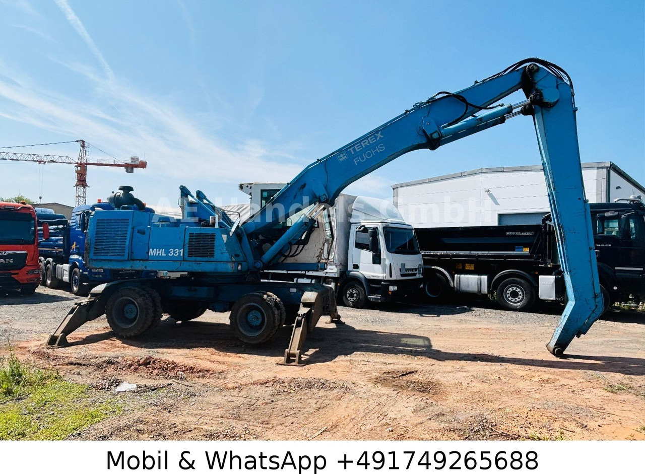 Terex MHL 331 Umschlagbagger - Pelle sur pneus: photos 2 Terex MHL 331 Umschlagbagger - Pelle sur pneus: photos 2