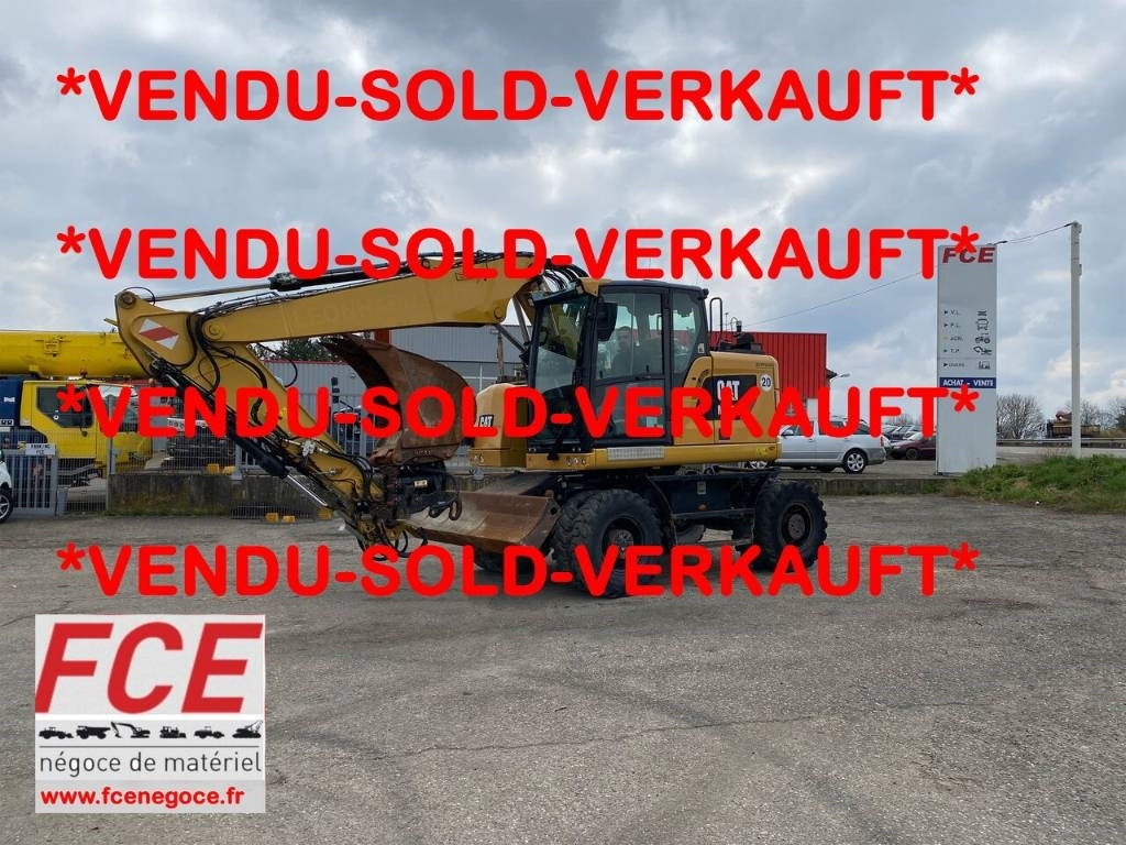 CAT M 315F /1er Main-Certificat CE Non accidenté - Pelle sur pneus: photos 1 CAT M 315F /1er Main-Certificat CE Non accidenté - Pelle sur pneus: photos 1