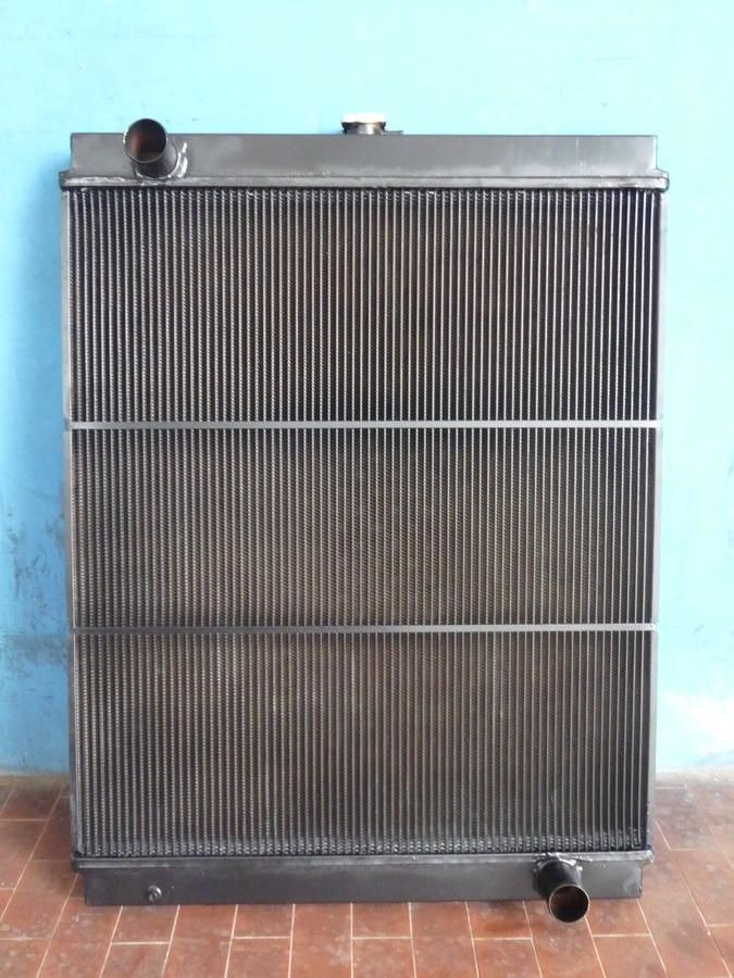 • RADIATORE NEW HOLLAND E195/215/245/ 87339771-72210130 - Radiateur: photos 1 • RADIATORE NEW HOLLAND E195/215/245/ 87339771-72210130 - Radiateur: photos 1