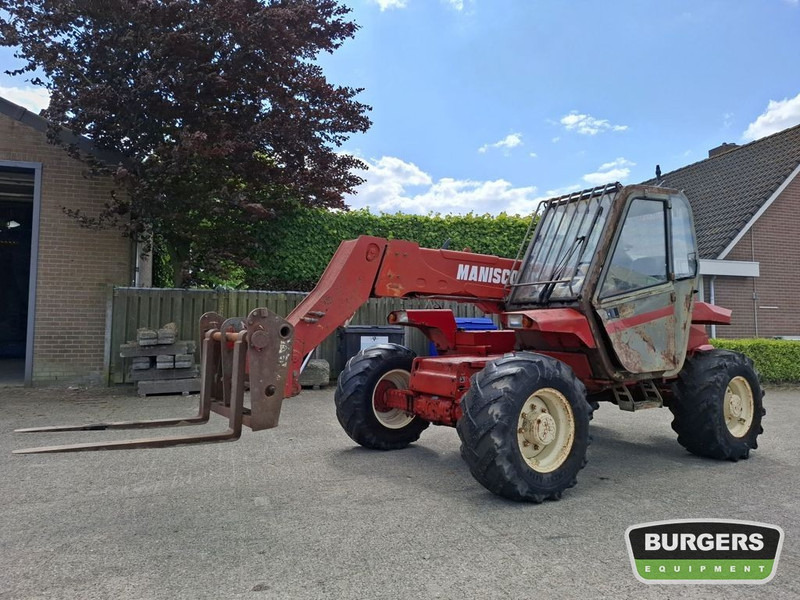 Manitou MT 727 - Chariot télescopique: photos 1 Manitou MT 727 - Chariot télescopique: photos 1