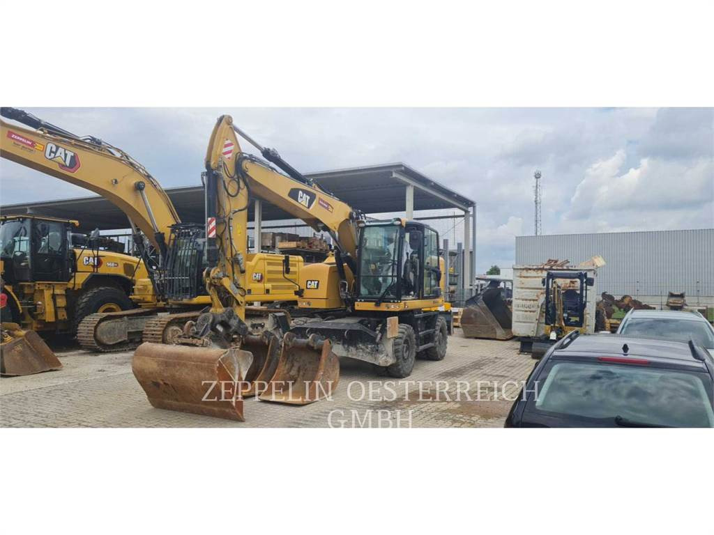 CAT M315F - Pelle sur pneus: photos 1 CAT M315F - Pelle sur pneus: photos 1