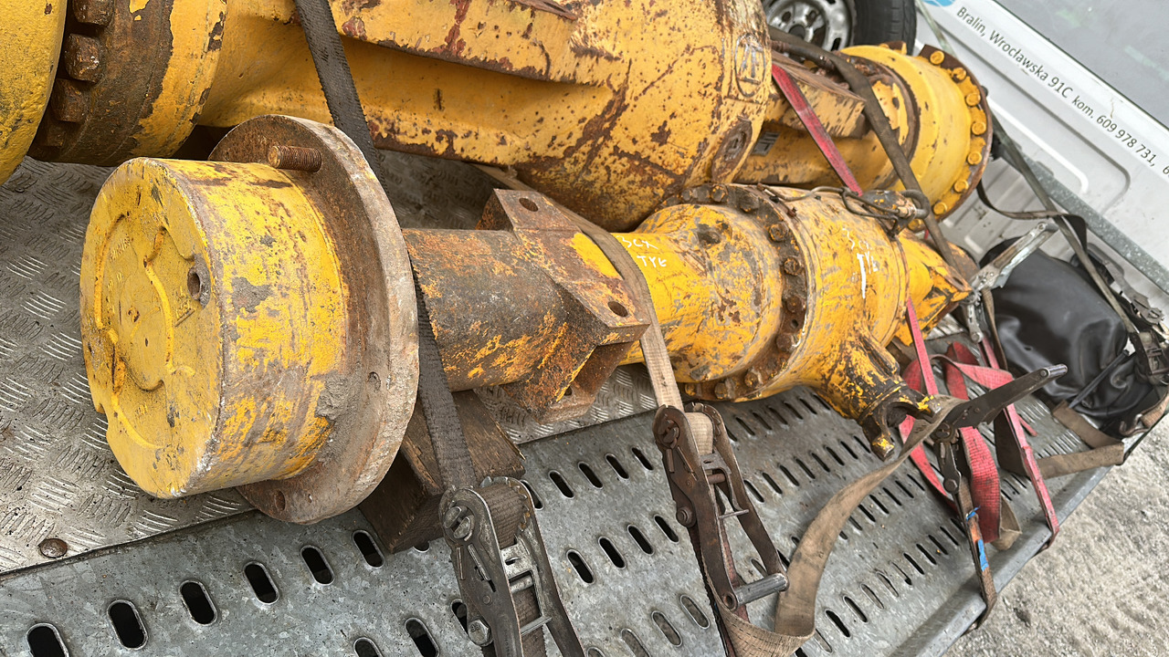 Jcb 3cx most napędowy tylni części zwolnica , obudowa mostu półoś , atak talerz - Demi arbre pour Machine agricole: photos 1 Jcb 3cx most napędowy tylni części zwolnica , obudowa mostu półoś , atak talerz - Demi arbre pour Machine agricole: photos 1