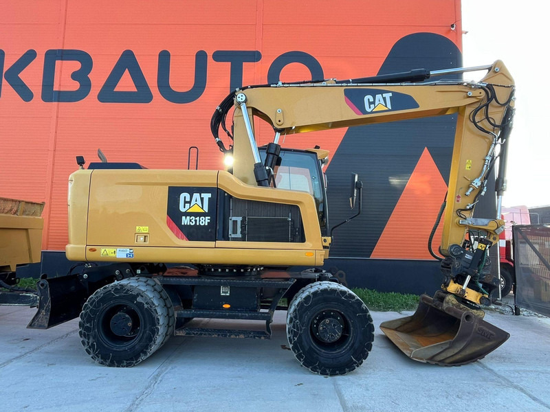 Caterpillar M 318 F ROTOTILT / CENTRAL LUBRICATION / AC - Pelle sur pneus: photos 4 Caterpillar M 318 F ROTOTILT / CENTRAL LUBRICATION / AC - Pelle sur pneus: photos 4