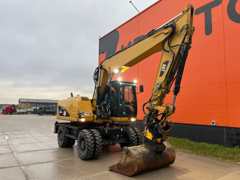 Caterpillar M316D / ROTOTILT/ AC / CENTRAL LUBRICATION / + EXTRA BUCKET - Pelle sur pneus: photos 3 Caterpillar M316D / ROTOTILT/ AC / CENTRAL LUBRICATION / + EXTRA BUCKET - Pelle sur pneus: photos 3