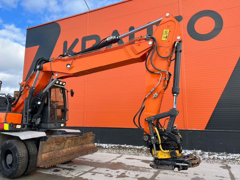 Pelle sur pneus Doosan DX 210 W-5 ROTOTILT / AC / CENTRAL LUBRICATION / WEBASTO: photos 9