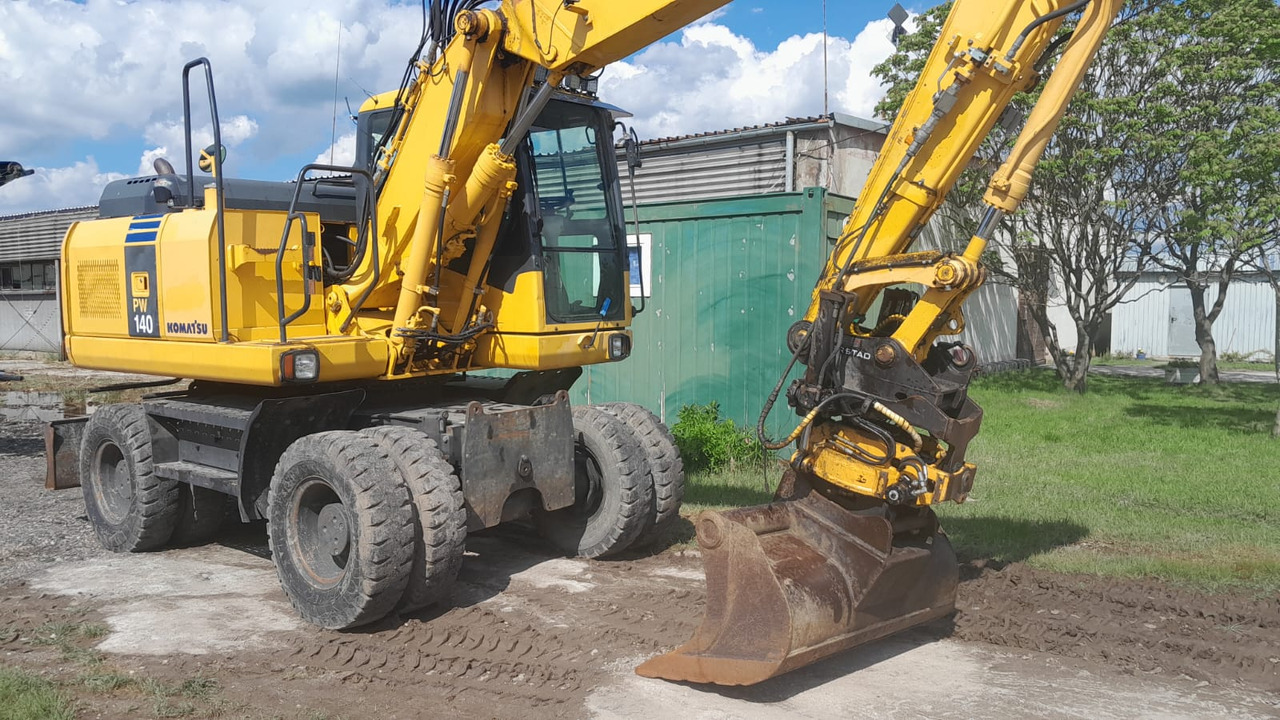 KOMATSU PW 140-7 - Pelle sur pneus: photos 4 KOMATSU PW 140-7 - Pelle sur pneus: photos 4