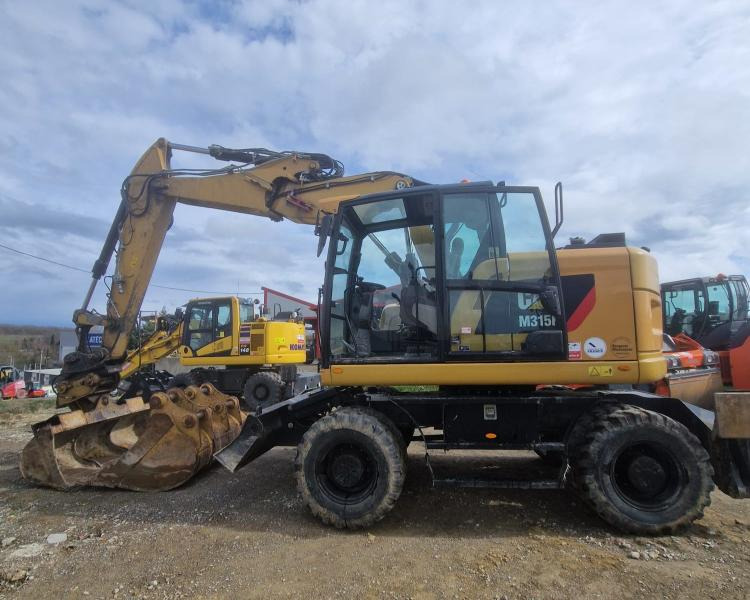 Caterpillar M315F F - Pelle sur pneus: photos 1 Caterpillar M315F F - Pelle sur pneus: photos 1