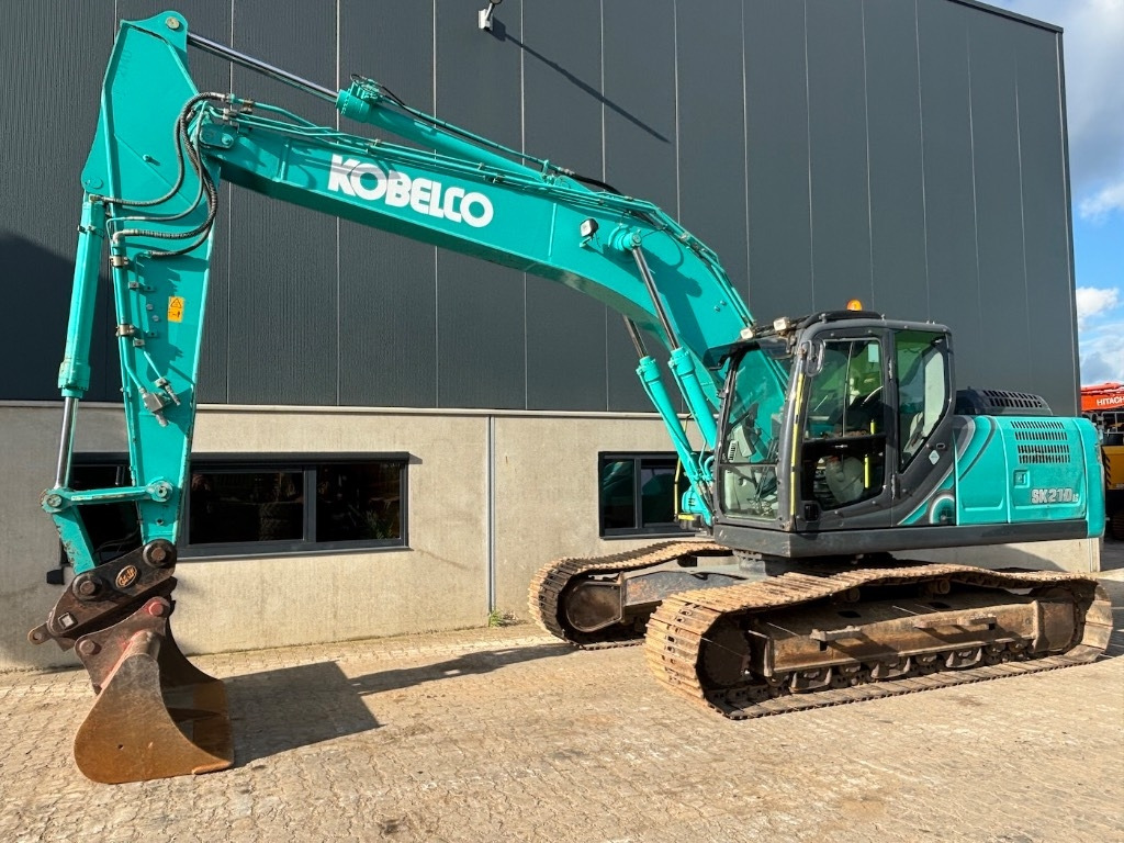 Kobelco SK 210 LC-10 - SK210 - SK210LC-10 - Pelle sur chenille: photos 1 Kobelco SK 210 LC-10 - SK210 - SK210LC-10 - Pelle sur chenille: photos 1