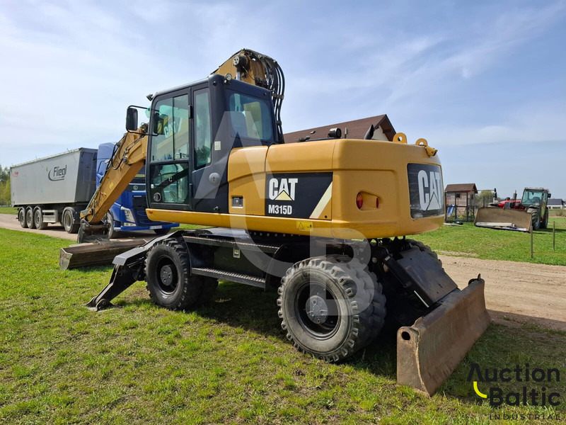 Caterpillar 315 D - Pelle sur pneus: photos 3 Caterpillar 315 D - Pelle sur pneus: photos 3