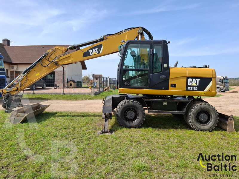 Caterpillar 315 D - Pelle sur pneus: photos 2 Caterpillar 315 D - Pelle sur pneus: photos 2