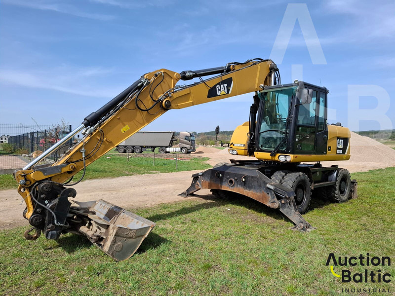 Caterpillar 315 D - Pelle sur pneus: photos 1 Caterpillar 315 D - Pelle sur pneus: photos 1