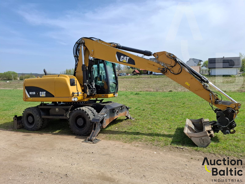 Caterpillar 315 D - Pelle sur pneus: photos 5 Caterpillar 315 D - Pelle sur pneus: photos 5
