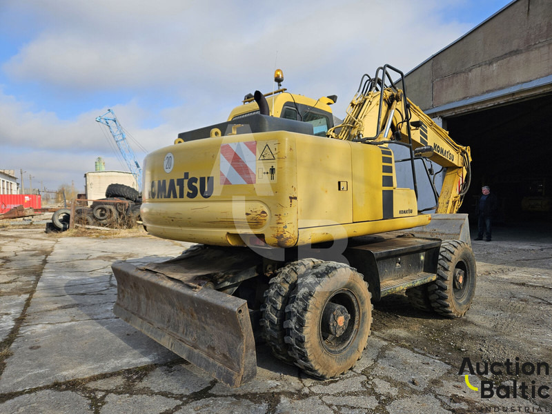 Komatsu PW130ES-6K - Pelle sur pneus: photos 3 Komatsu PW130ES-6K - Pelle sur pneus: photos 3