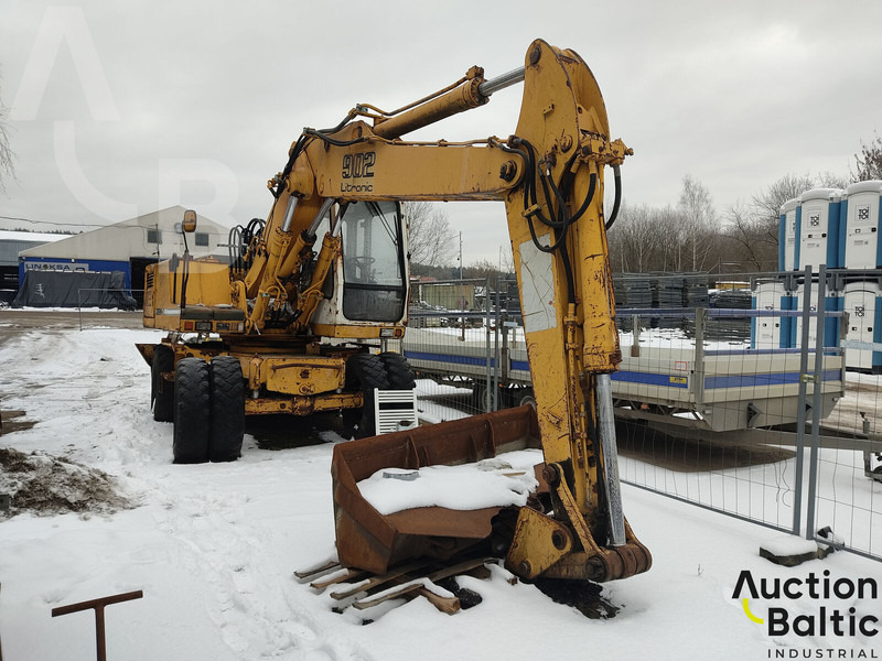 Liebherr 902 Litronic - Pelle sur pneus: photos 1 Liebherr 902 Litronic - Pelle sur pneus: photos 1
