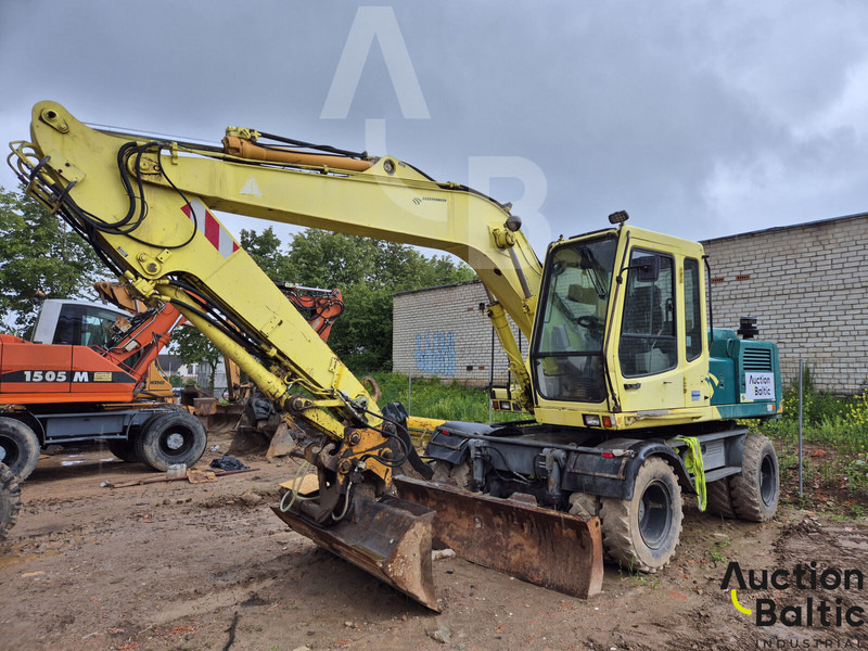 Liebherr A 900 B Litronic - Pelle sur pneus: photos 1 Liebherr A 900 B Litronic - Pelle sur pneus: photos 1